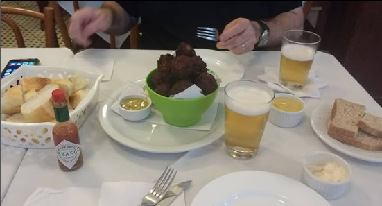 Caranguejo ao molho de cebolas e tomates do Bar Heinz em Santos
